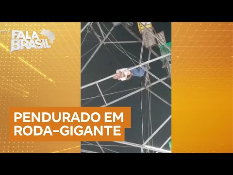 Homem fica pendurado em roda-gigante no Acre após cair de cabine