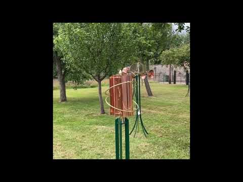 Kinetic wind sculpture copper twist