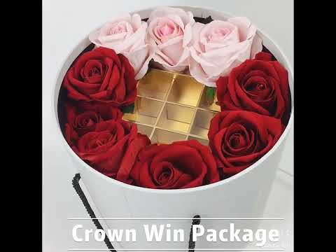 A round chocolate gift box with flower,it's a very good anniversary gift box!