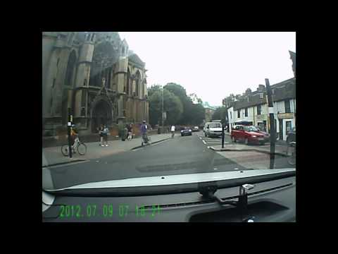 Cyclist in close call, motorist didn't even notice.