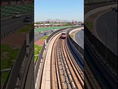 Metro de Santiago Línea 4A (AS02) próximo a ingresar a Estación La Granja
