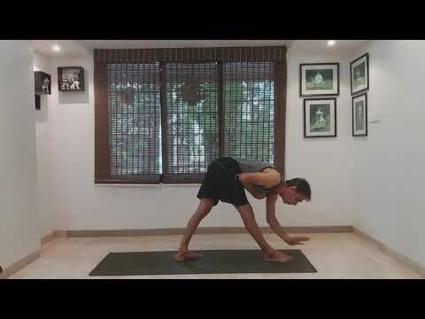 This pose can put you in the best shape of your life. Parivrtta Trikonasana