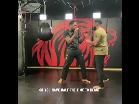 MICHAEL JAI WHITE TEACHING JON JONES HIS TRUE VERSION OF THE FRONT KICK !! STIPE FELT THIS KICK !!!!