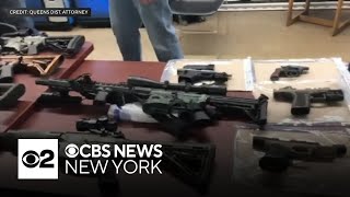 Dozens of firearms confiscated from Queens home