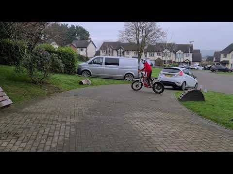 Liam on his oset 24 electric trials bike