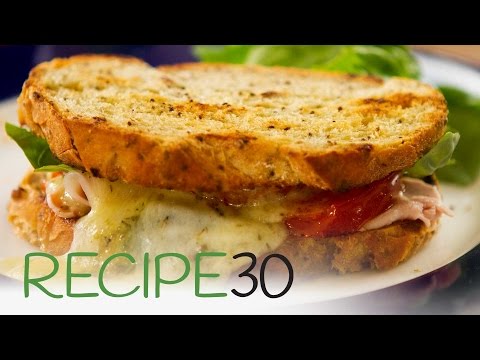 The Best Toasted Cheese and Ham Sandwich, Italian style with tomato and basil