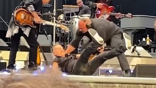 Bruce Springsteen falls on stage while performing 