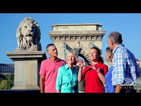 Tour group listening to guide in Europe