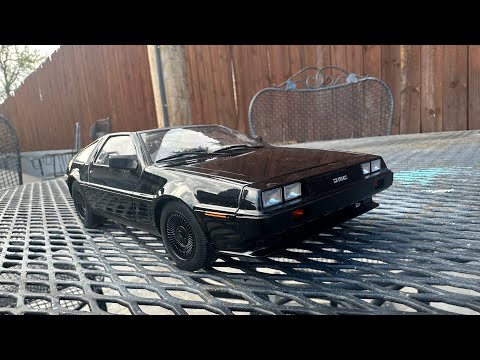 Here is my 1/18 scale autoart  DeLorean ￼black