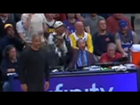 Rockets announcer Craig Ackerman punches Ryan Hollins in the face during live game