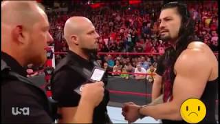 Roman Reigns handcuffed beaten up by Brock Lesnar