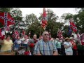 Confederate flag supporters sing I Wish I Was in Dixie