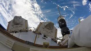NASA Astronaut Randy "Komrade" Bresnik stepping outside of ISS wearing a GoPro