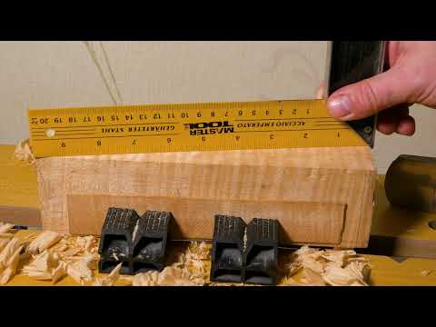 Preparing a maple blank for making a violin scroll.