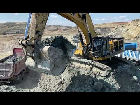 Caterpillar 390D Hydraulic Excavator Loading Mercedes & MAN Trucks - Interkat SA