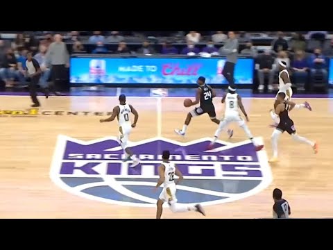 Buddy Hield with the spinning half court shot 👀