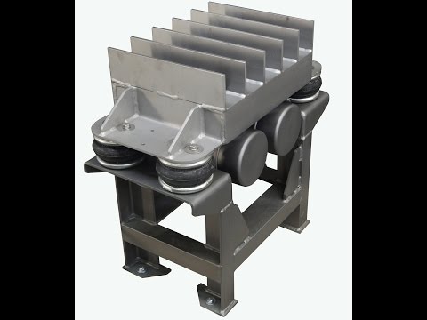 Grid Top Vibratory Table for Settling Soy Meal - Cleveland Vibrator Co.