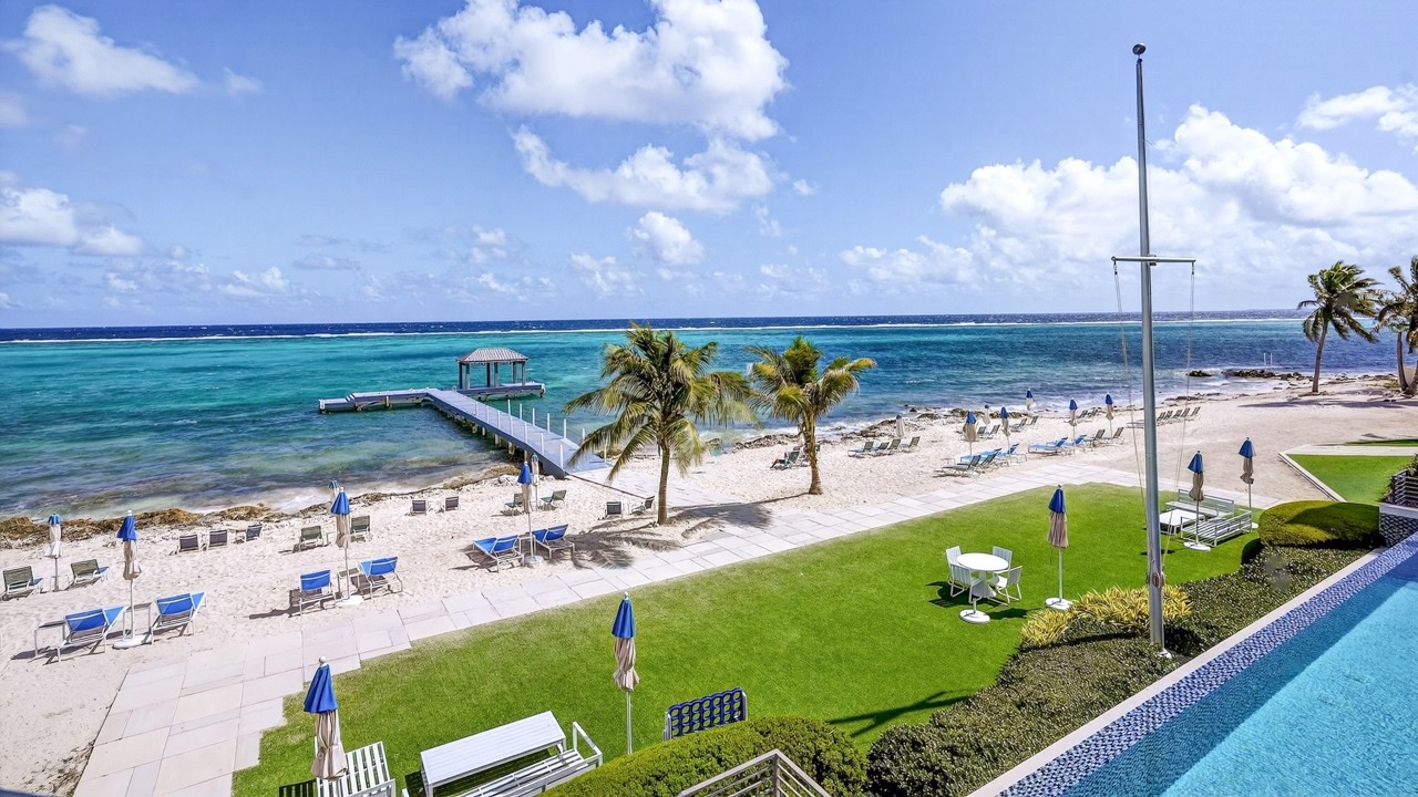 RUM POINT RESORT | RESIDENCE 203 BEACHFRONT CONDO