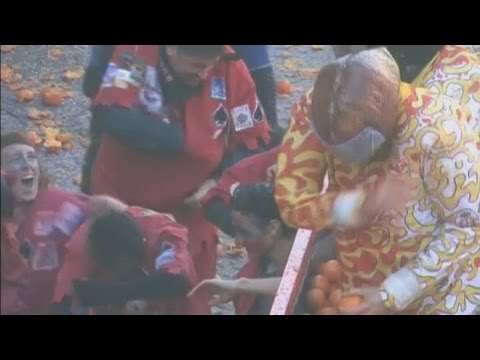 Battle of the Oranges: Italians pelt each other with fruit in Ivrea