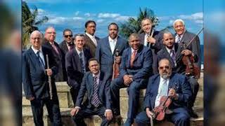 Baila Carola Lyrics English Translation