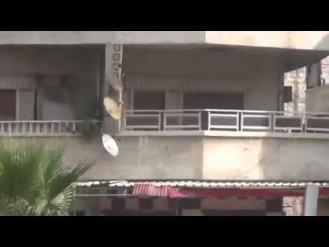 اشتباكات  بين ألوية شهداء معرة النعمان وقوات النظام أثناء معارك تحرير  مدينة معرة النعمان