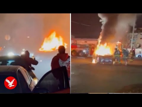 Security guard's car set on fire after he tried to shut down street takeover in New York City