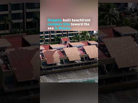 Illegally built beachfront complex tilts toward the sea in Mexico