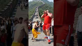 Download lagu A tough combat fighter challenges a kung fu monk at the Great Wall. #fight mp3