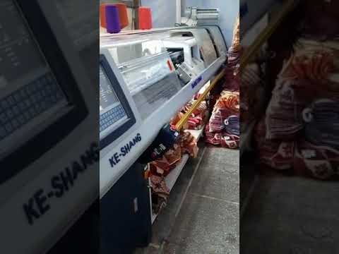 Computerized flat knitting machine