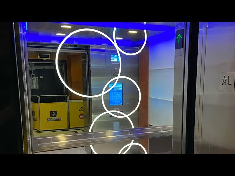 Beautiful Dover/Otis Touchscreen Traction Elevators | Miami Beach, FL