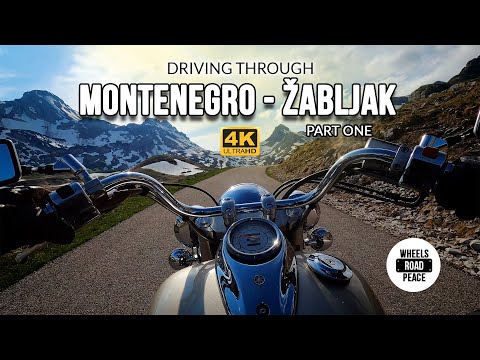 Driving motorcycle through beautiful mountain Zabljak in Montenegro // 4K UHD