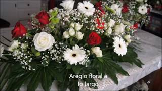 Arreglo de flores para mesa principal.