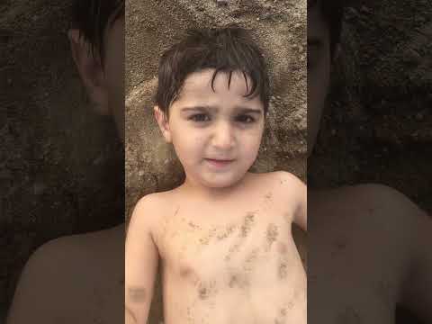 Mustafa and Adam on beach