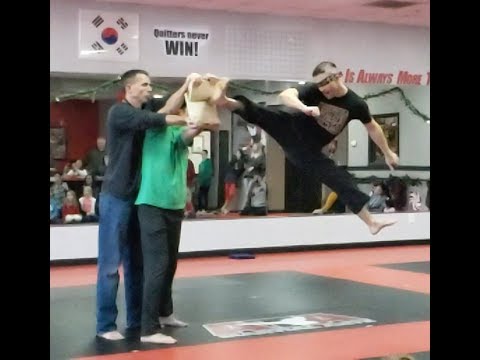 Blind Folded Jump Spin Hook Kick Breaking 2 Wooden Boards