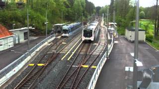 preview picture of video 'Oslo T-bane train from Ringen to Bekkestua departing Jar station.'