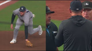 Ryan McMahon Drops the Ball on a Transfer, Umpire Calls No Catch on the Play