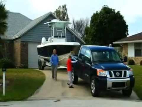 Part of a video titled How to Tow and Trailer a Boat - iboats.com - YouTube