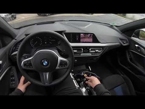 Driving a car with automatic transmission BMW 1 Series 118i (F40) Automatic Transmission (Sport E...