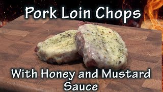 Delicious Pork Loin chops smothered with Honey and Mustard sauce and topped off with Herbed Cheese.