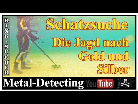 Probe in the water with my metal detector. Beautiful underwater shots of the treasure hunt.