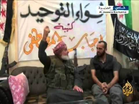 تقرير قناة الجزيرة عن أبو الطيب شيخ المجاهدين جد سوري من حلب يشكل كتيبة من أبنائه وأحفاده