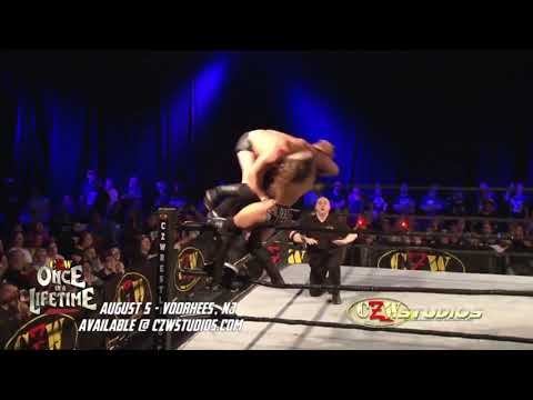 Lio Rush suplexes Joey Janela through 2 tables