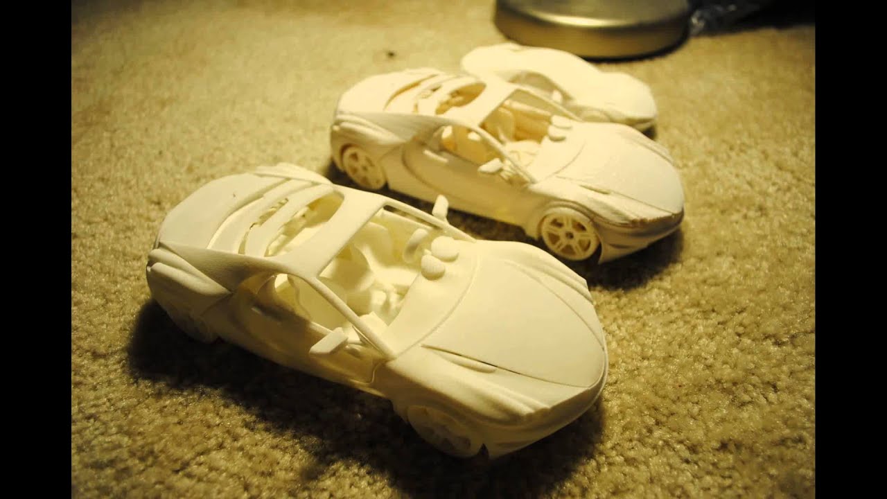 3D printable car with movable doors, hoods, steering wheel and wheels 3D print model from CGTrade...