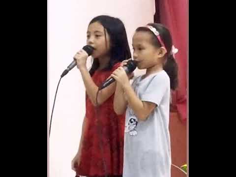 cute kids in duet sings "I got Jesus medley" by heritage singers