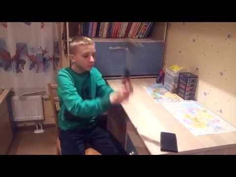 Russian Kid Breaks his mobile phone ( FAIL )