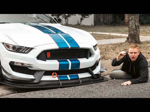 How to drive a low car in and out of a steep driveway.