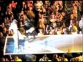 Joe Perry pushes Steven Tyler off a stage