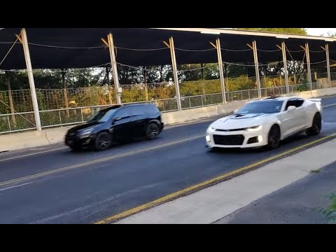 Thumbnail for Rav4 V6 drag races Camaro at Yellow Belly 1/8th mile track - outside view by Toyota RAV4