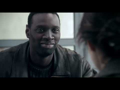 Samba trailer still — late-night Paris streets where soul and reggae cues carry the subtext