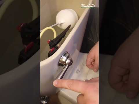 Part of a video titled How to change a Toilet Handle - Easy Step-by-step Guide #shorts